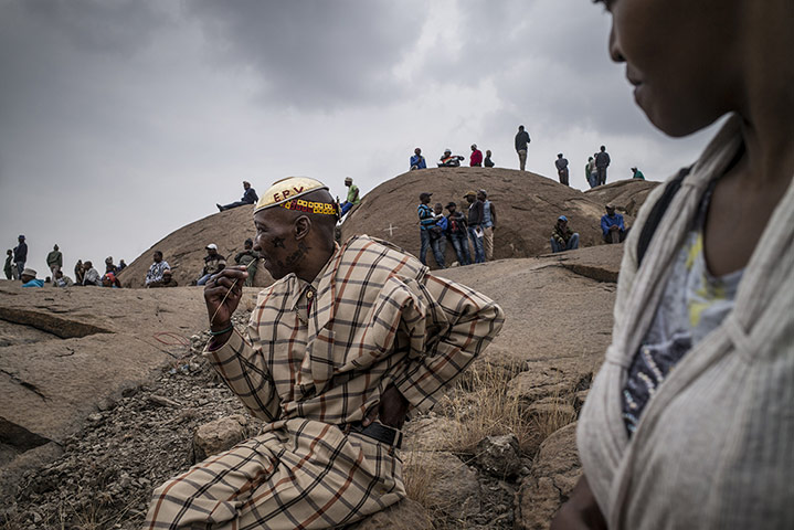 20 Photos: People gather for a tribute to the miners who were gunned down in Marikana