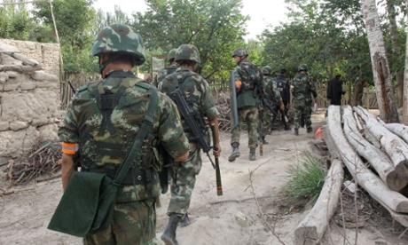 Chinese police on an anti-terror operation in Xinjiang.