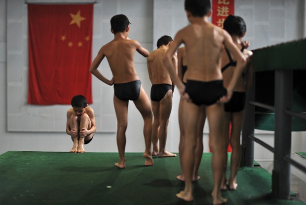Hefei, China: young divers queue up at the platform to take their turn in a provincial competition