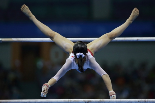 Nanjing, China: Sae Miyakawa of Japan competes in the women's uneven bars final on day seven of Nanjing 2014 Summer Youth Olympic Games