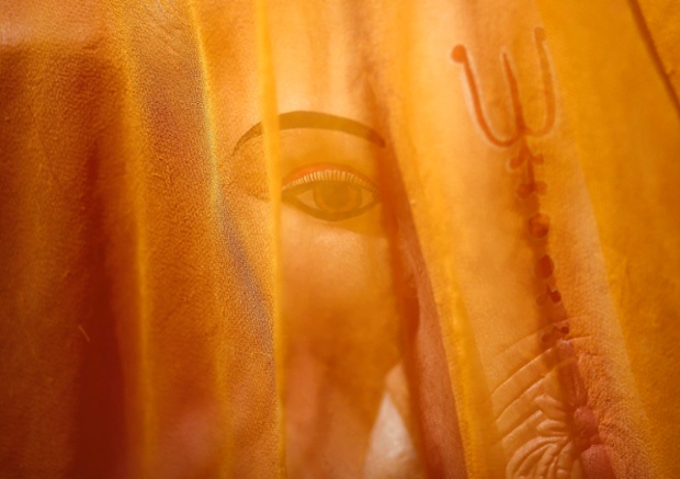 A cloth covers Ganesh - the Hindu elephant god of prosperity, at the Ganesh Chaturthi festival in New Delhi