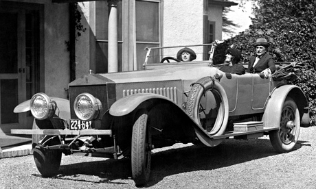 Film star Mabel Normand drives a vintage-era Rolls-Royce in 1921