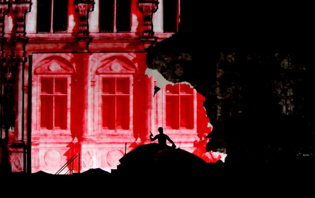 A light show staged during a celebration marking the 70th anniversary of Paris Liberation from Nazi rule in Paris last night