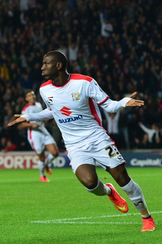 Benik Afobe celebrates scoring their third goal