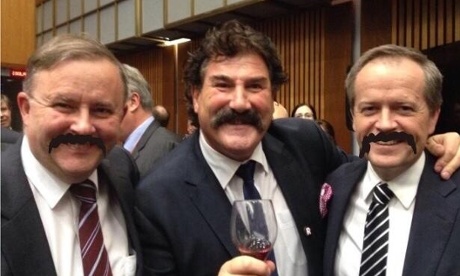 Picture altered by one of Anthony Albanese's talented constituents. Opposition leader Bill Shorten, Anthony Albanese and Dipper at the Launch of the Parliamentary friends of AFL, Tuesday 26th August 2014