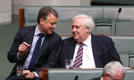 Joel Fitzgibbon talks to the member for Fairfax and PUP leader Clive Palmer during question time in the House of Representatives, Wednesday 27th August 2014