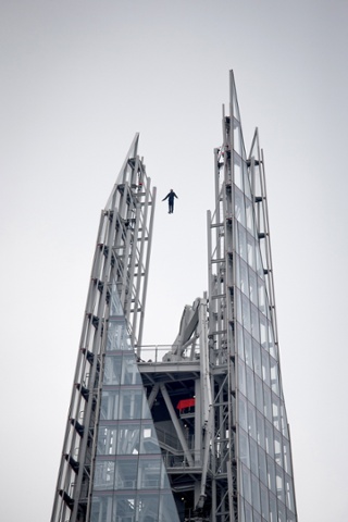 Magician Dynamo appears to levitate over the Shard skyscraper in London.  Rising into the air from the viewing platform at the top of building, stunned residents and tourists looked up in amazement as he continued to ascend between the shard towers.