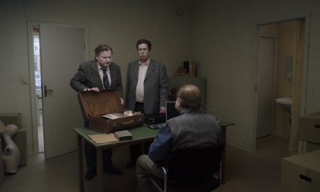 A scene from A Pigeon Sat on a Branch Reflecting on Existence.