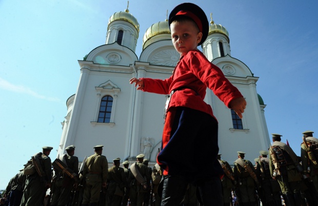 A boy takes part in a ceremony commemorating the 100th anniversary of the first world war in Tsarskoye Selo