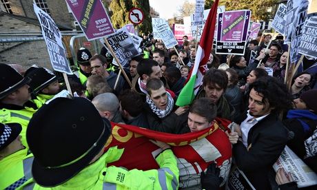 Police and anti-fascist protesters clash in Cambridge