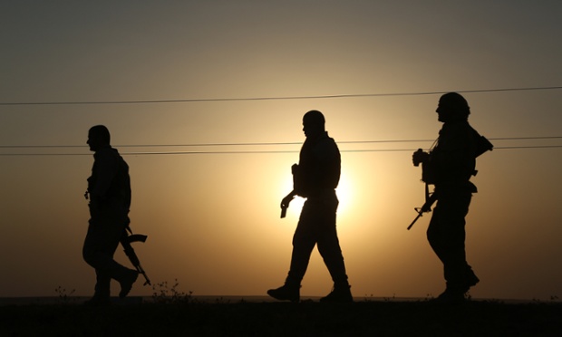 Kurdish Peshmergas patrol the town of Rabia which was previously seized by Islamic State of Iraq and the Levant (ISIL) in Mosul, Iraq on August 4,2014. Peshmergas forces deploy more troops to the area due to possible ISIL threat.