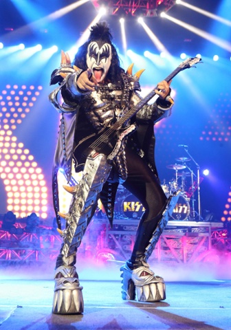 Gene Simmons of Kiss spots the photographer as he performs on stage at Saratoga Springs, New York