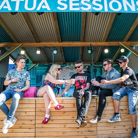 Matua Bestival gallery: Matua: the members of Paper Boats share a post-gig drink with a fan