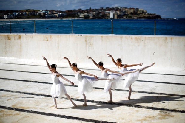 Dancers from the Australian Ballet are pictured inside an empty Bondi Icebergs oceanside pool in Sydney
