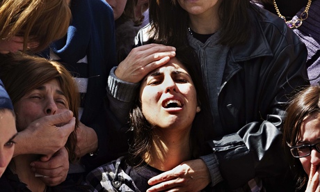 Mother of Miriam Monsonego at funeral of her daughter 