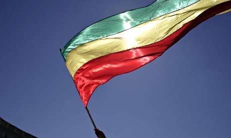Ethiopian man waves Ethiopian flag