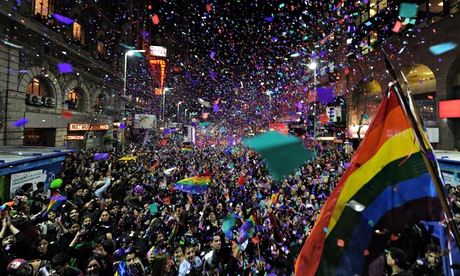 People dance and cheer during the annual
