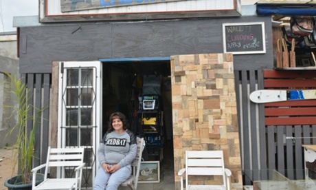 Lorna Thompson, outside the frame shop she and her husband run from the front of their house, opposite The Old Biscuit Mill.