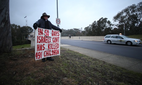 A lone protestor at the ministerial entrance to Parliament House, Canberra this morning.