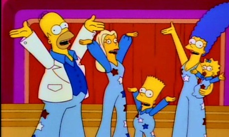 The Simpsons sing.