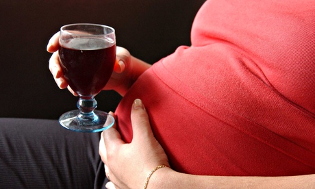 Pregnant woman drinking