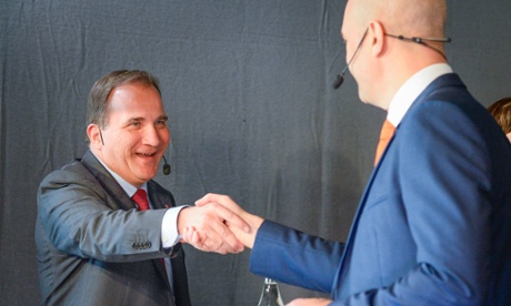 Swedish Prime Minister and leader of the Moderate Party in Sweden, Fredrik Reinfeldt shakes hands with Stefan Loefven, leader of the Social Democratic Party in Sweden ahead of a debate.