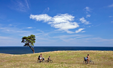 Family cycling on bicycles in Sweden