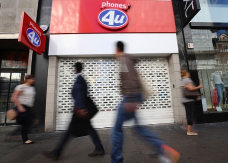 A Phones 4U shop in Oxford Street in central London with its shutters down as more than 500 of its stores were shut after the retail chain went into administration.