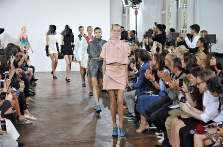 A model walks the runway at the JW Anderson show