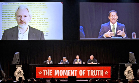 Wikileaks founder Julian Assange appears at the Moment of Truth rally in Auckland via video link