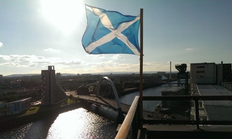 Blue Sky over Scotland, a Saltire fluttering in the breeze near the Clyde.