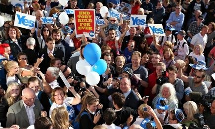 Alex Salmond gives a thumbs up during a walkabout on the last day of campaigning. Photograph: Andrew Milligan/PA
