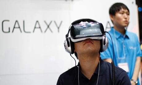 A visitor tries out Samsung's Gear VR powered by Oculus during the Tokyo Game Show