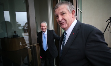 Western Australian Liberal senator Chris Back and NSW Labor senator Doug Cameron at the senate doors.