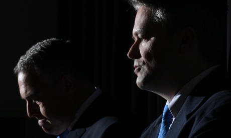 Treasurer Joe Hockey and Finance Minister Mathias Cormann at a press conference to explain the deal done with Palmer.