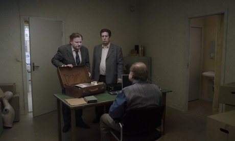 A scene from A Pigeon Sat on a Branch Reflecting on Existence