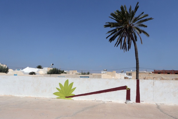 A mural by Polish artist M-city is part of the street art project 'Djerbahood' in the village of Erriadh on the island of Djerba