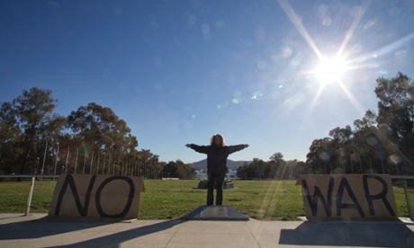 Lone anti-war protestor Meredith Rose out the front of Parliament this morning.