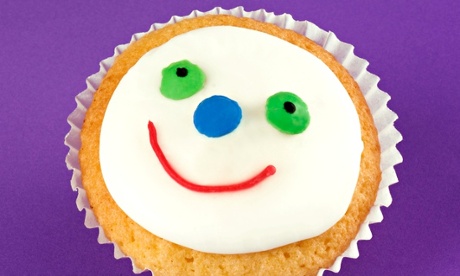 smiley face on cupcake