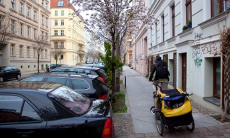 A man cycles through the Mitte district, which straddles parts of old East and West Berlin.