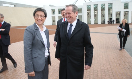 The Leader of the Opposition Bill Shorten with Leader in the Senate Penny Wong on their way to an AMWU event promoting the building of submarines in Australia, out the front of Parliament House in Canberra this afternoon, Thursday 25th September 2014.