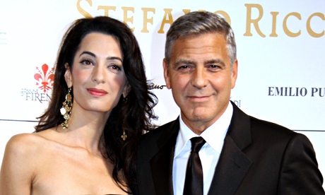 George Clooney arrives with his fiancee Amal Alamuddin