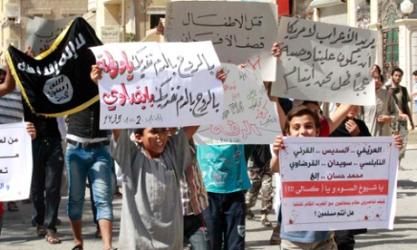 Protest against the US air strikes in Raqqa, Syria, 26 September 2014.