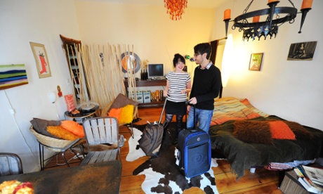 A couple arrive in their Airbnb apartment - but peer-to-peer holiday rentals are just the beginning