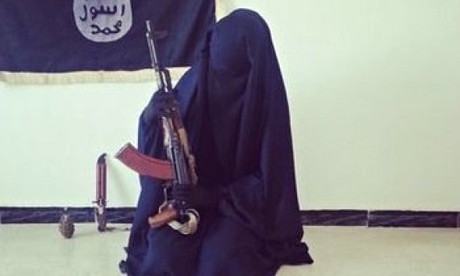 Zahra Halane, 16, poses with an AK-47, an Isis flag, knife and grenade. A series of tweets about her