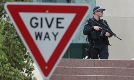 As cabinet considers Australia's involvement in Iraq this week, upgraded security measures around parliament house is in place. Photograph: Mike Bowers