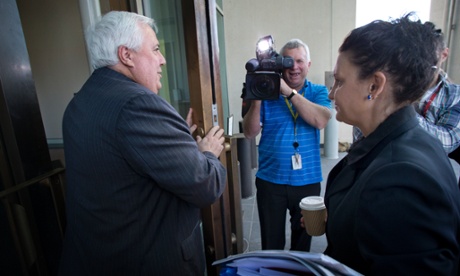 PUP Leader Clive Palmer and Tasmanian PUP senator Jacqui Lambie cross paths at the senate door this morning.