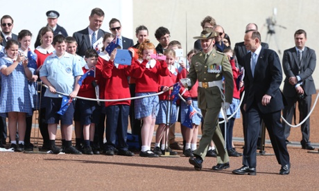 The Prime Minister attends a flag raising ceremony to mark National Flag Day.