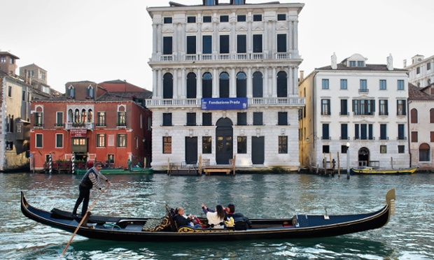 A gondola sails on the Grand Canal in Venice.