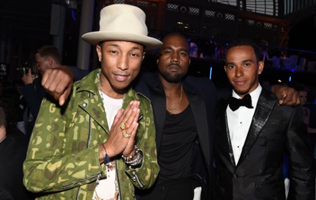 Pharrell Williams with Kanye West and Lewis Hamilton at the GQ Men of the Year awards